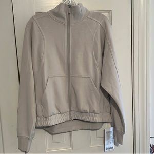 Lululemon brushed softstreme funnel neck zip up
In white opal NWT